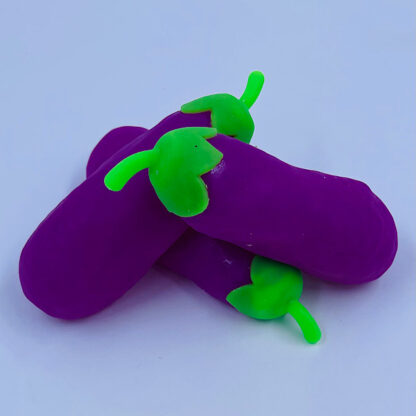 aubergine med orbeez vandperle stressbold grøntsag frugt bold stress front
